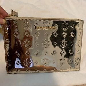 Michael Kors gold vinyl wristlet, new with tags